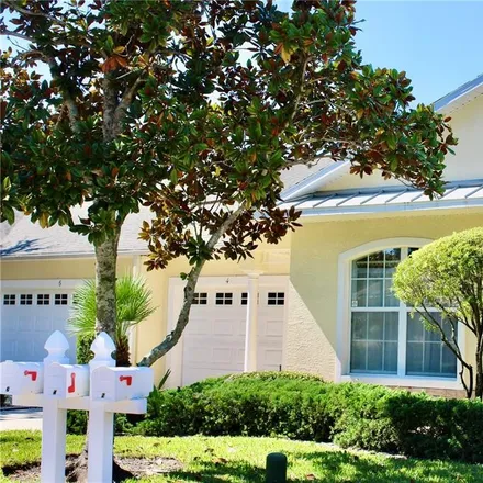 Buy this 2 bed condo on Palm Harbour Golf Club in Linear Park Trail, Palm Coast