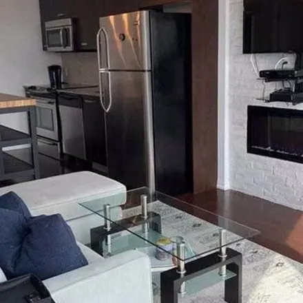 Rent this 1 bed apartment on Nando's in 832 Bay Street, Old Toronto