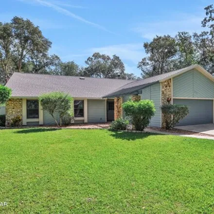Buy this 5 bed house on 317 Oak Fern Circle in Ormond Beach, FL 32174