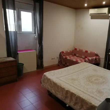 Rent this 11 bed room on Rua Tomás Borba 20 in 1000-197 Lisbon, Portugal