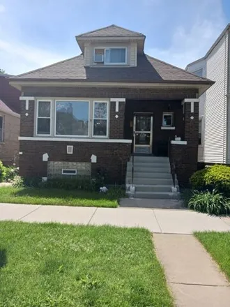 Buy this 4 bed house on 3446 N Lowell Ave in Chicago, Illinois