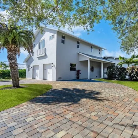 Buy this 4 bed house on 5112 Sandy Cove Avenue in Bailey Hall, Siesta Key