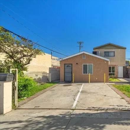 Rent this 3 bed house on 1022 West 84th Place in Los Angeles, CA 90044