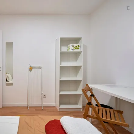 Rent this 6 bed room on Rua Carvalho Araújo 75 in 1900-140 Lisbon, Portugal