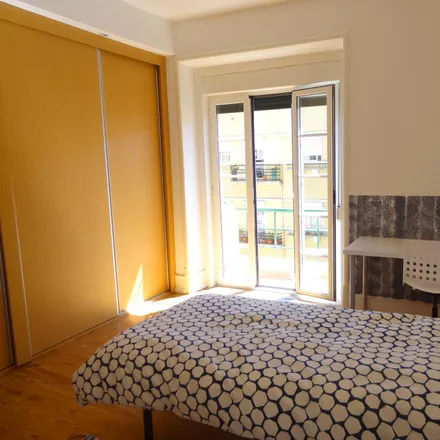 Rent this 4 bed room on Rua Filipe da Mata in 1600-993 Lisbon, Portugal