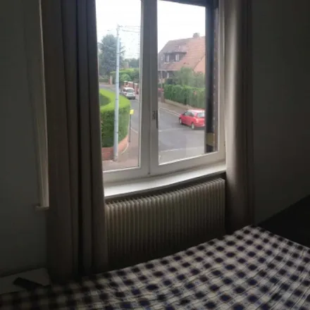 Rent this 3 bed room on 76 Rue du XXème Siècle in 59160 Lomme, France