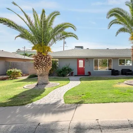 Rent this 3 bed house on 3915 East Whitton Avenue in Phoenix, AZ 85018