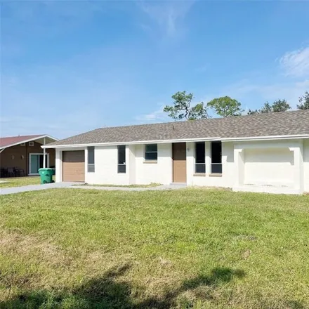 Buy this 4 bed house on 958 Tropical Avenue Northwest in Port Charlotte, FL 33948