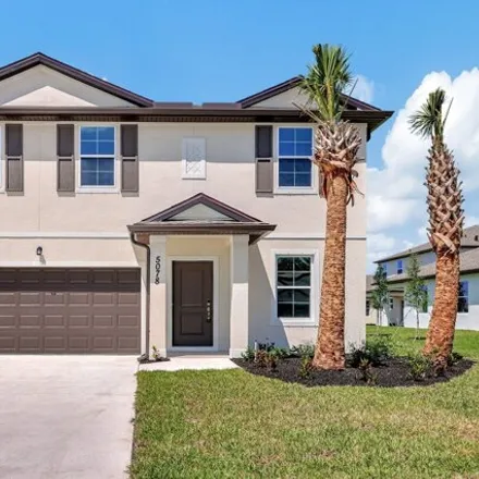 Rent this 5 bed house on Armina Place in Lakewood Park, FL 34951
