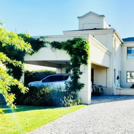 Rent this 4 bed house on Buenos Aires Golf Club in Mayor Irusta, Partido de San Miguel
