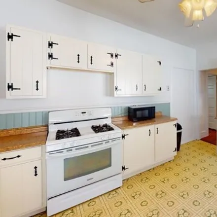 Rent this 4 bed condo on 21 Romsey Street in Boston, MA 02125