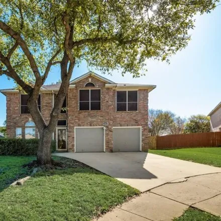 Rent this 4 bed house on 6099 Team Court in Arlington, TX 76018