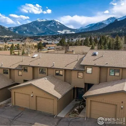 Buy this 2 bed condo on Columbine Inn in Big Thompson Road, Stanley Heights Subdivision