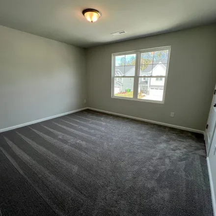 Rent this 4 bed apartment on 7151 Norton Lane in Raleigh, NC 27616