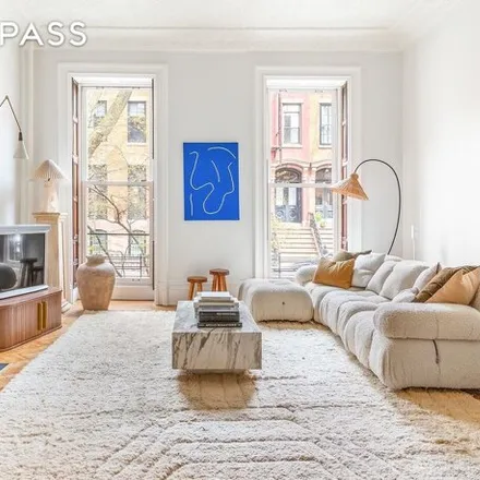 Buy this 6 bed townhouse on 176 Warren Street in New York, NY 11201