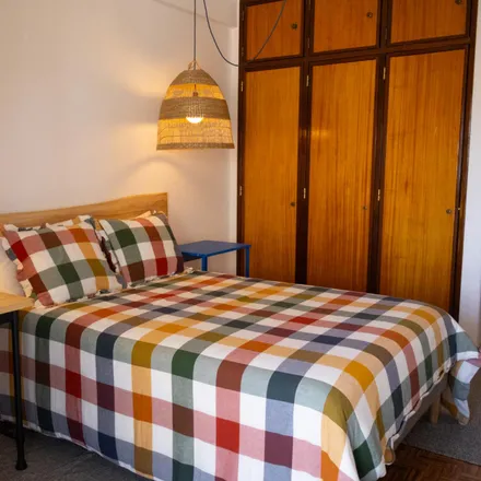 Rent this 4 bed room on Rua Francisco Baía in 1500-581 Lisbon, Portugal