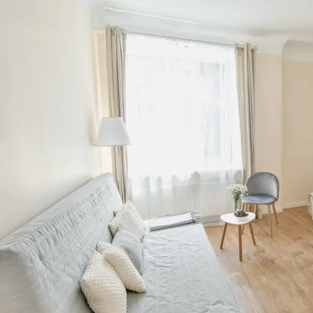 Rent this 4 bed room on Alfrēda Kalniņa iela 8 in Riga, LV-1050