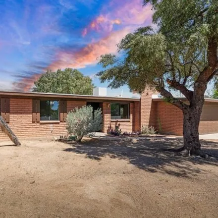 Buy this 4 bed house on 7876 North John Hancock Avenue in Pima County, AZ 85741