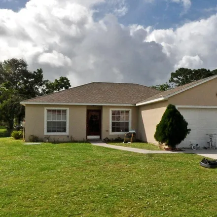 Rent this 4 bed house on 2152 Southwest Best Street in Port Saint Lucie, FL 34984