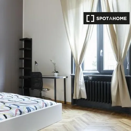 Rent this 4 bed room on Via Enrico Caruso in 20059 Milan MI, Italy