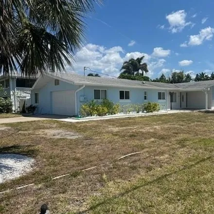 Rent this 3 bed house on 106 14th Street in Belleair Beach, Pinellas County