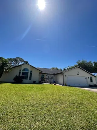Rent this 3 bed house on 1953 Southeast Cheltenham Street in Port Saint Lucie, FL 34983