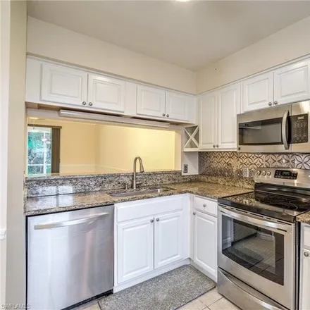 Rent this 3 bed condo on 6633 Huntington Lakes Circle in Collier County, FL 34119