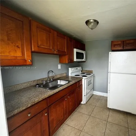 Rent this 2 bed apartment on 4075 Southwest 24th Street in Carver Ranches, West Park