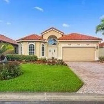 Rent this 3 bed house on 4932 Gateway Gardens Drive in Palm Beach County, FL 33436