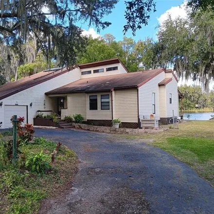 Buy this 5 bed house on 21878 Pineywood Loop in Land O' Lakes, FL 34639