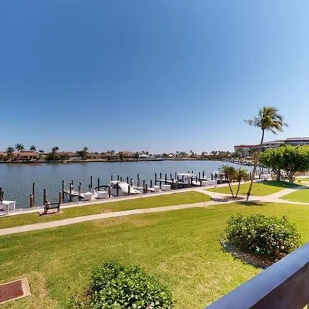 Buy this 2 bed condo on Bayside Court in Marco Island, FL 33937