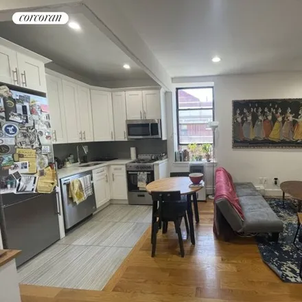 Rent this 4 bed apartment on 167 W 122nd St # 4DD in New York, 10027