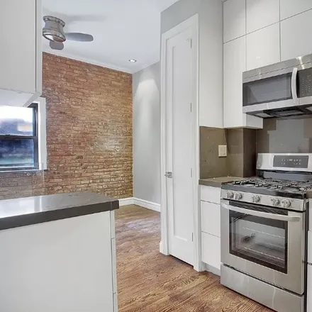 Rent this 4 bed duplex on E 26th St