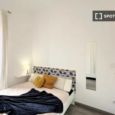 Rent this 6 bed room on Calle de Montserrat in 28015 Madrid, Spain