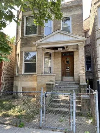 Buy this 4 bed house on 1328 North Avers Avenue in Chicago, IL 60651
