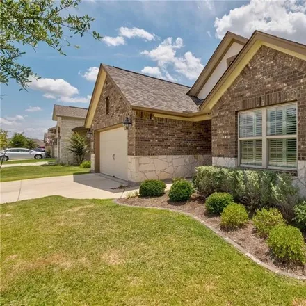 Rent this 4 bed house on 2133 Montesol Lane in Leander, TX 78641