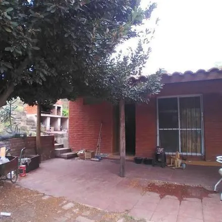 Buy this 4 bed house on Carlos Paz Golf Club in Francisco García, Departamento Punilla
