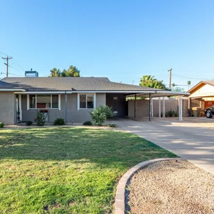 Rent this 3 bed house on 1422 West Orange Drive in Phoenix, AZ 85013