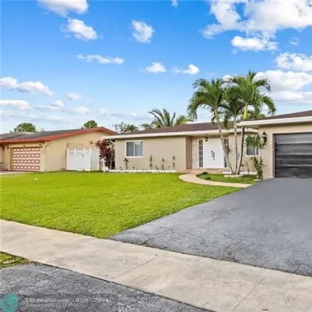 Buy this 3 bed house on 7480 Nw 15th St in Plantation, Florida