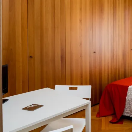Rent this 3 bed room on Foppa in Via Enrico Stendhal, 20144 Milan MI