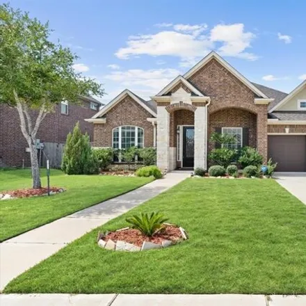 Buy this 4 bed house on Whispering Manor Lane in Pearland, TX 77581