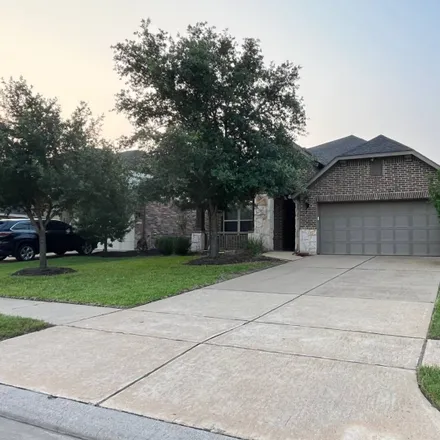 Rent this 2 bed house on 19183 North Sawtooth Canyon Drive in Harris County, TX 77377
