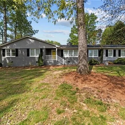 Buy this 4 bed house on 5134 Forest Oaks Drive in Forest Oaks, Guilford County