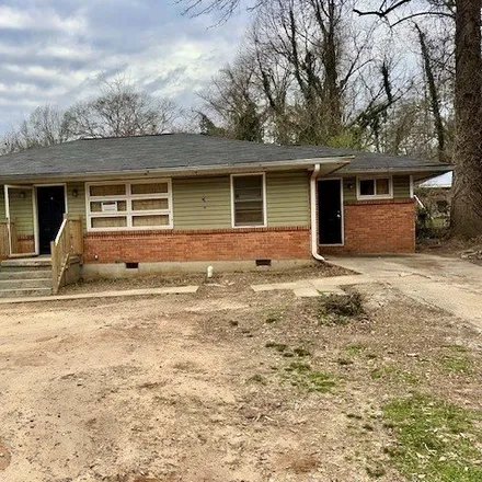 Buy this 3 bed house on 2311 Sheryl Drive in Candler-McAfee, GA 30032