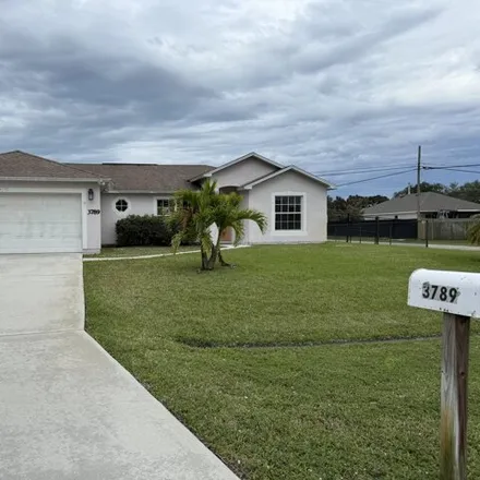 Buy this 3 bed house on 301 Southwest Dagget Avenue in Port Saint Lucie, FL 34953