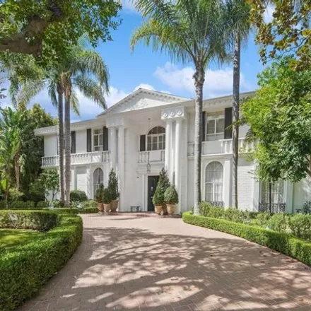 Rent this 6 bed house on 717 North Rodeo Drive in Beverly Hills, CA 90210
