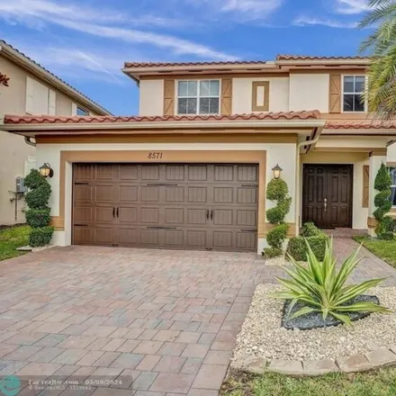 Rent this 4 bed house on 8571 Waterside Court in Parkland, FL 33076