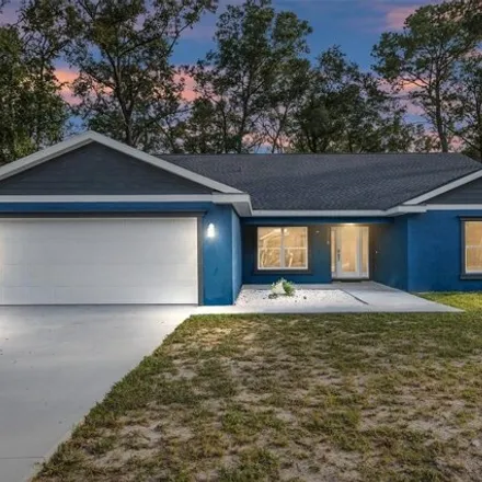 Buy this 4 bed house on 5298 Northwest 55th Place in Marion County, FL 34482