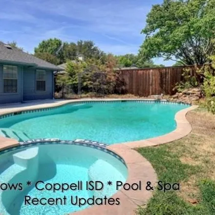 Buy this 4 bed house on 840 Parkway Boulevard in Coppell, TX 75019