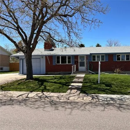 Buy this 4 bed house on 7059 South Cherry Street in Centennial, CO 80122